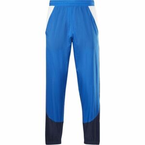 Reebok TRAIN WOVEN PANT Pánske šuštiakové nohavice, modrá, veľkosť